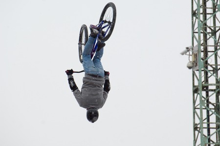 MOSCOW, RUSSIA - DECEMBER 10, 2016: Unidentified rider jump on bike trampoline on Winter game season opening event on December 10, 2016のeditorial素材