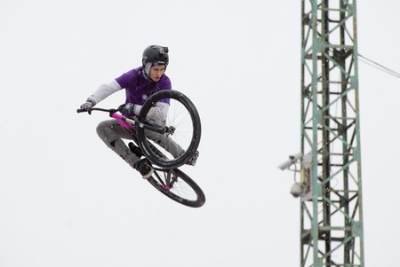MOSCOW, RUSSIA - DECEMBER 10, 2016: Unidentified rider jump on bike trampoline on Winter game season opening event on December 10, 2016のeditorial素材