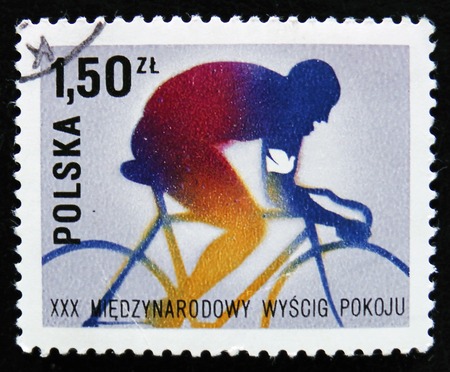 MOSCOW, RUSSIA - APRIL 2, 2017: A post stamp printed in Poland shows bicyclist, devoted to 30 International Peace Bicycling Race, Warsaw-Berlin-Prague, circa 1977のeditorial素材