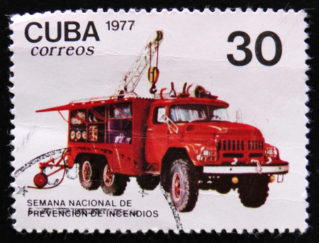 MOSCOW, RUSSIA - APRIL 2, 2017: A post stamp printed in Cuba shows Crane truck, Accident prevenion...