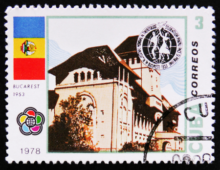 MOSCOW, RUSSIA - APRIL 2, 2017: A stamp printed in Cuba, shows postage stamp IV World Youth Festival in Bucharest. International festival of youth and students in 1953, circa 1978のeditorial素材