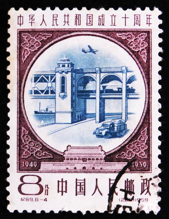 MOSCOW, RUSSIA - APRIL 2, 2017: A post stamp printed in China shows Wuhan Yangtze River Bridge, a dual-use road-rail bridge, circa 1959のeditorial素材