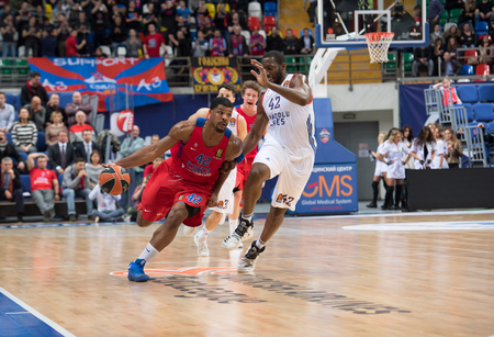 MOSCOW, RUSSIA - JANUARY 27, 2017: K. Hines (42) vs B. Dunston (42) on basketball game CSKA vs Anadolu Efes on Regular championship of Euroleague on January 27, 2017, in Moscow, Russia. CSKA won 80:77のeditorial素材