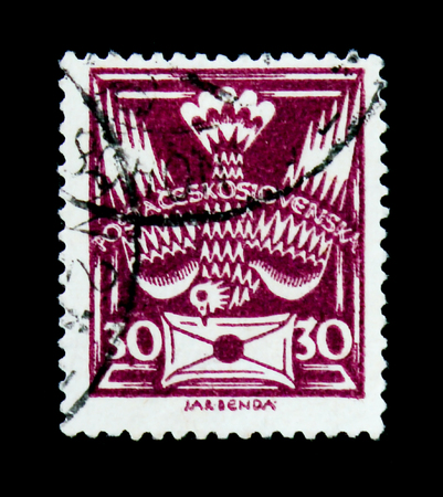 MOSCOW, RUSSIA - JUNE 20, 2017: A stamp printed in Czechoslovakia shows carrier pigeon with letter, circa 1920のeditorial素材