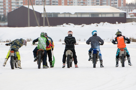 BREKHOVO, MOSCOW REGION, RUSSIA - JANUARY 21, 2017: Unidentified riders on start during Winter open cup of DOSAAF MX Speedway on January 21, 2017のeditorial素材