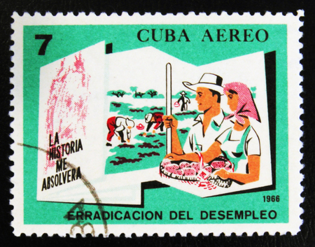MOSCOW, RUSSIA - JULY 15, 2017: A stamp printed in Cuba shows People in agriculture with the inscription "Eradication of unemployment" from the series "Conquests of the Revolution", circa 1966のeditorial素材