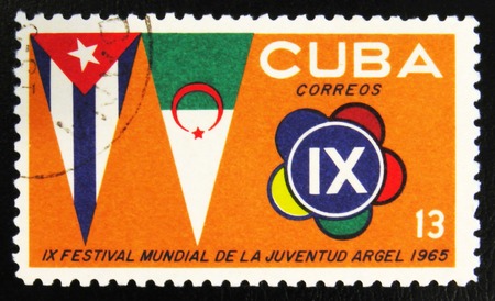 MOSCOW, RUSSIA - JULY 15, 2017: A stamp printed in Cuba shows pennants, 9th festival, circa 1965