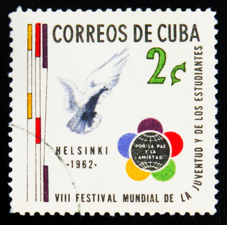 MOSCOW, RUSSIA - JULY 15, 2017: A stamp printed in Cuba showsVIII World festival of youth and...