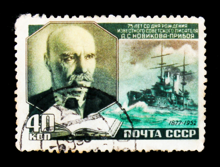 MOSCOW, RUSSIA - JUNE 26, 2017: A stamp printed in USSR (Russia) shows portrait of the Alexey Novikov-Priboi (1877-1944) was Russian writer, circa 1952のeditorial素材