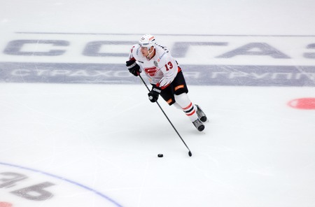 PODOLSK, RUSSIA - SEPTEMBER 3, 2017: N. Lemtyugov (13) in action on hockey game Vityaz vs Avangard on 10th Russia KHL championship on September 3, 2017, in Podolsk, Russia. Vityaz won 6:2のeditorial素材