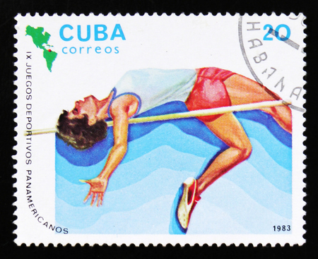 MOSCOW, RUSSIA - JUNE 26, 2017: A stamp printed in Cuba shows high jump, 9th Pan American games, circa 1983のeditorial素材