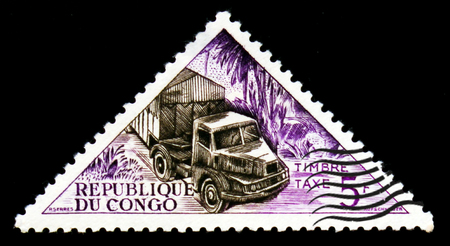 MOSCOW, RUSSIA - SEPTEMBER 3, 2017: A stamp printed in Congo shows Post truck, Transport serie, circa 1961のeditorial素材