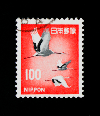 MOSCOW, RUSSIA - SEPTEMBER 3, 2017: A stamp printed in Japan shows Red-crowned Crane (Grus japonensis), serie, circa 1979のeditorial素材