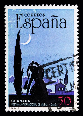 MOSCOW, RUSSIA - MAY 10, 2018: A stamp printed in Spain shows Festival of Music & Dance, Granada, Popular Festivals: Horse Fair in Jerez serie, circa 1988のeditorial素材