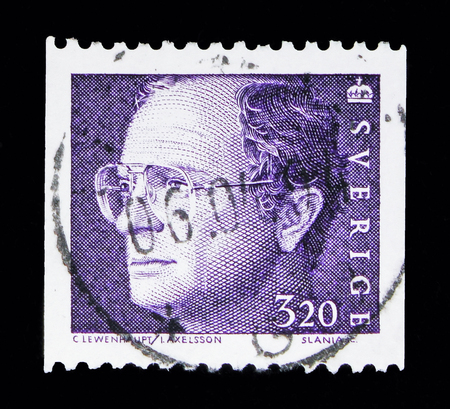 MOSCOW, RUSSIA - MAY 10, 2018: A stamp printed in Sweden shows King Carl XVI Gustaf, serie, circa 1994のeditorial素材