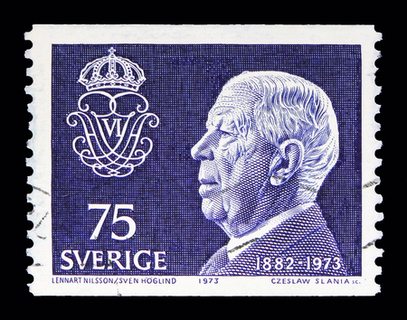 MOSCOW, RUSSIA - MAY 10, 2018: A stamp printed in Sweden shows King Gustaf VI Adolf, serie, circa 1973のeditorial素材