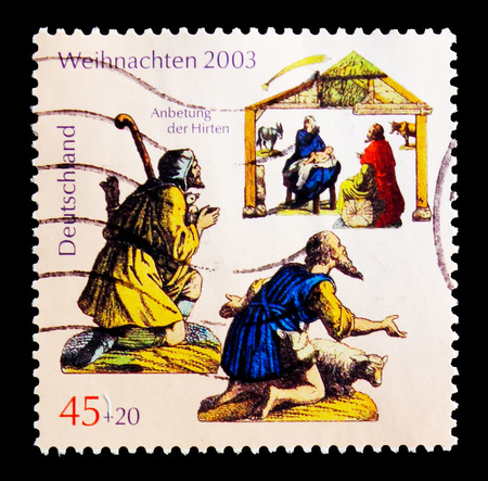 MOSCOW, RUSSIA - OCTOBER 21, 2017: A stamp printed in German Federal Republic shows Adoration of the Shepherds, Christmas 2003 serie, circa 2003のeditorial素材
