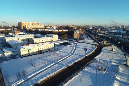 Aerial view of Podolsk traffic roads on winter sunny morningの写真素材
