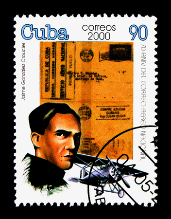 MOSCOW, RUSSIA - NOVEMBER 25, 2017: A stamp printed in Cuba shows Airplane, cover, Jaime Gonzales, pilot of first experimental, Stamp day serie, circa 2000のeditorial素材