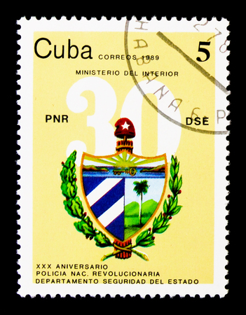 MOSCOW, RUSSIA - NOVEMBER 25, 2017: A stamp printed in Cuba shows PNR symbol, National Revolutionary Police, 30th anniversary serie, circa 1989のeditorial素材