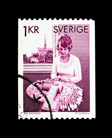 MOSCOW, RUSSIA - NOVEMBER 24, 2017: A stamp printed in Sweden shows Lace-maker, serie, circa 1977のeditorial素材