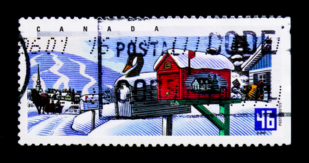 MOSCOW, RUSSIA - NOVEMBER 24, 2017: A stamp printed in Canada shows Goose head and house, 
Traditional Rural Mailboxes serie, circa 2000のeditorial素材