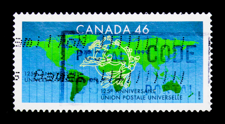 MOSCOW, RUSSIA - NOVEMBER 24, 2017: A stamp printed in Canada shows Universal Postal Union, 125th Anniversary, 1874-1999, serie, circa 1999のeditorial素材