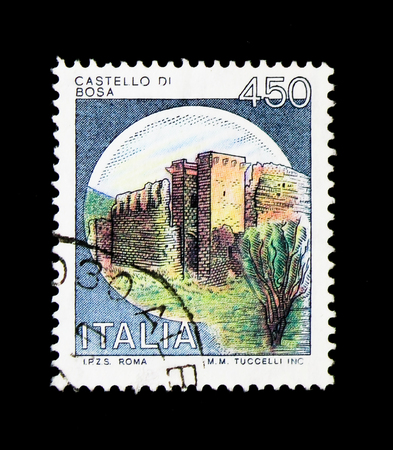 MOSCOW, RUSSIA - NOVEMBER 24, 2017: A stamp printed in Italy shows Castles - Bosa, serie, circa 1980のeditorial素材