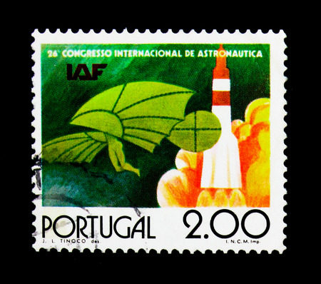 MOSCOW, RUSSIA - NOVEMBER 24, 2017: A stamp printed in Portugal devoted to 26th Congress of the International Astronautical Federation, serie, circa 1976のeditorial素材
