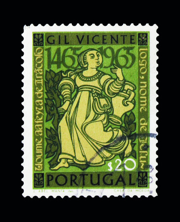 MOSCOW, RUSSIA - NOVEMBER 24, 2017: A stamp printed in Portugal shows Figures from Gil Vincente's Theatre Plays, 500th Birthday serie, circa 1965のeditorial素材