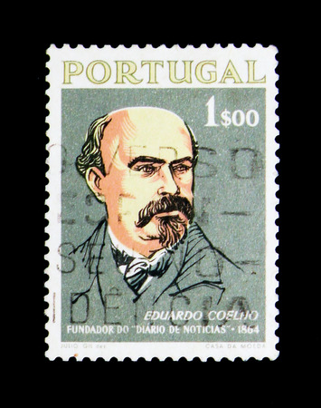 MOSCOW, RUSSIA - NOVEMBER 24, 2017: A stamp printed in Portugal shows Eduardo Coelho (1835-89) journalist and founder, serie, circa 1964のeditorial素材