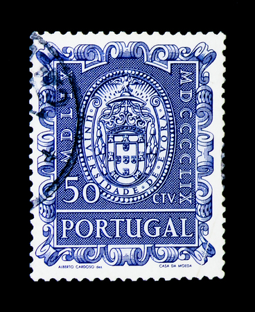 MOSCOW, RUSSIA - NOVEMBER 24, 2017: A stamp printed in Portugal shows Seal of the university, 400 years University of Evora serie, circa 1960のeditorial素材