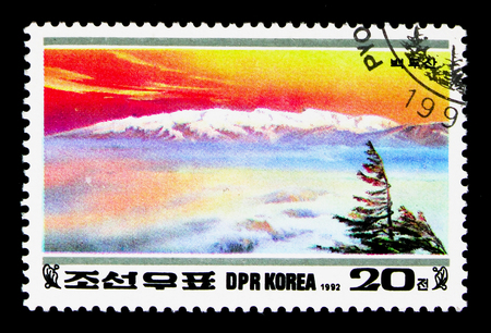 MOSCOW, RUSSIA - NOVEMBER 24, 2017: A stamp printed in Democratic People's republic of Korea shows Paektu, 50th Birthday of Kim Jong Il: Paektu Mountains serie, circa 1992のeditorial素材
