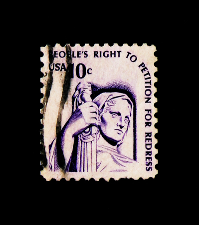 MOSCOW, RUSSIA - NOVEMBER 24, 2017: A stamp printed in USA shows Contemplation of Justice by J.E. Fraser, Americana Issue serie, circa 1977のeditorial素材