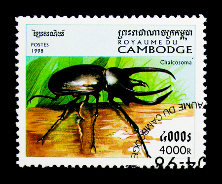 MOSCOW, RUSSIA - NOVEMBER 24, 2017: A stamp printed in Cambodia shows Atlas Beetle (Chalcosoma sp.), Insect serie, circa 1998のeditorial素材
