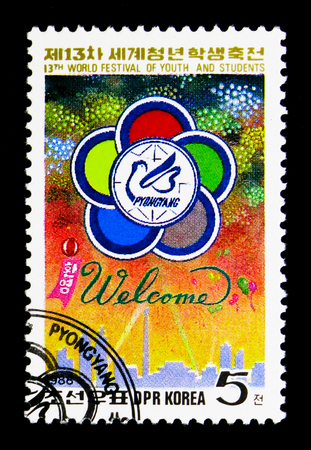 MOSCOW, RUSSIA - NOVEMBER 24, 2017: A stamp printed in Democratic People's republic of Korea shows Emblem, fireworks, 13th World Festival of Youth and Students, Pyongyang (I) serie, circa 1988のeditorial素材