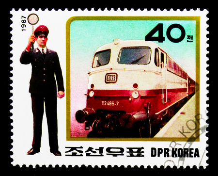 MOSCOW, RUSSIA - NOVEMBER 24, 2017: A stamp printed in Democratic People's republic of Korea shows Railways and Metro, Uniforms of railway staff serie, circa 1987のeditorial素材