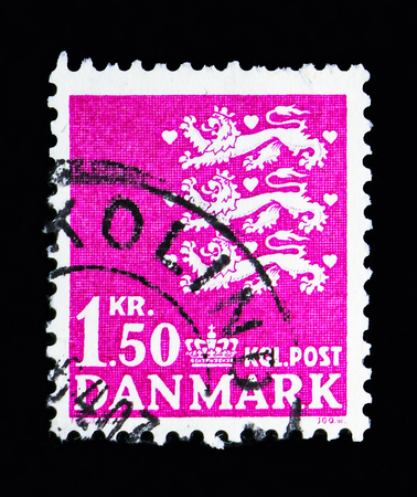 MOSCOW, RUSSIA - MAY 13, 2018: A stamp printed in Denmark shows Coat of arms, serie, circa 1970