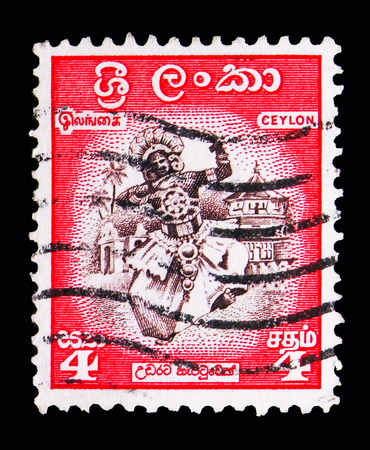MOSCOW, RUSSIA - MAY 13, 2018: A stamp printed in Ceylon shows Dancer from Kandy, Local motives serie, circa 1958のeditorial素材