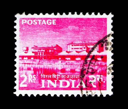 MOSCOW, RUSSIA - MAY 13, 2018: A stamp printed in India shows Rare earth factory, Five Year Plan serie, circa 1959のeditorial素材