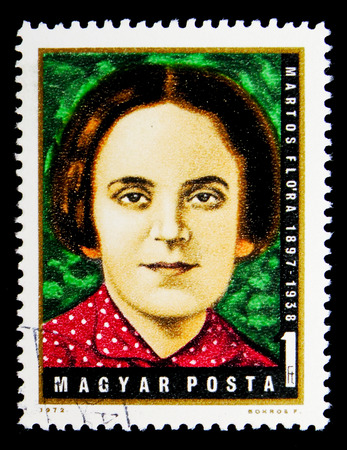 MOSCOW, RUSSIA - MAY 16, 2018: A stamp printed in Hungary shows Flora Martos (1897-1938) fighter for the labourers movement, Personalities serie, circa 1972のeditorial素材