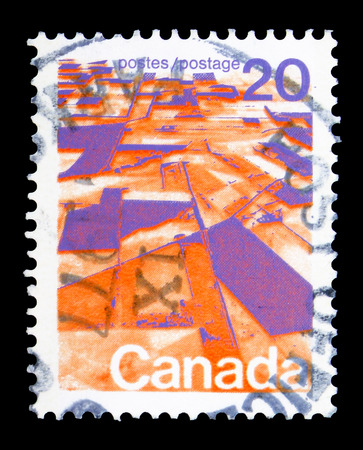 MOSCOW, RUSSIA - MAY 16, 2018: A stamp printed in Canada shows Prairie landscape from the air, Definitives 1972-77 serie, circa 1972のeditorial素材