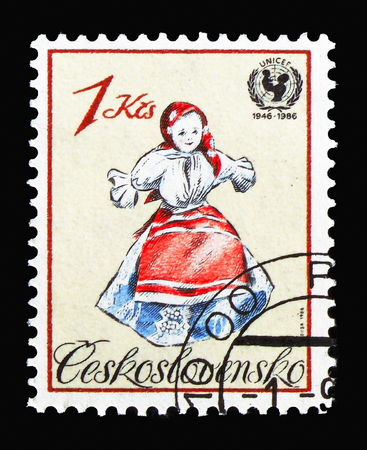 MOSCOW, RUSSIA - AUGUST 18, 2018: A stamp printed in Czechoslovakia shows UN Child Survival Campaign TOYS - Doll, UNICEF, 40th Anniversary serie, circa 1986のeditorial素材