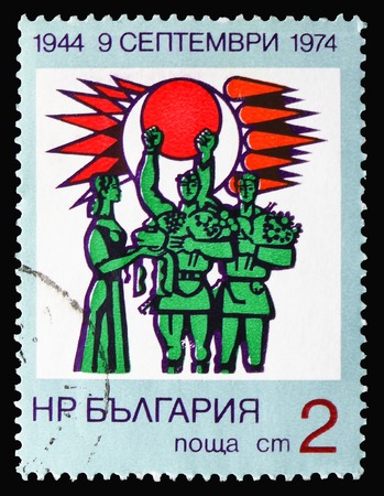 MOSCOW, RUSSIA - SEPTEMBER 15, 2018: A stamp printed in Bulgaria shows Receiving the Soviet Soldiers, 30 Years People's Government serie, circa 1974のeditorial素材
