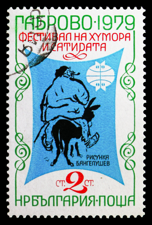 MOSCOW, RUSSIA - SEPTEMBER 15, 2018: A stamp printed in Bulgaria shows Boris Angelusev: The wily Peter, International Festival of Humour and Satire, Gabrovo serie, circa 1979のeditorial素材