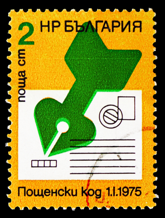 MOSCOW, RUSSIA - SEPTEMBER 15, 2018: A stamp printed in Bulgaria shows Pen pointing to Code Field of an Envelope, Introduction of Postcodes serie, circa 1974のeditorial素材