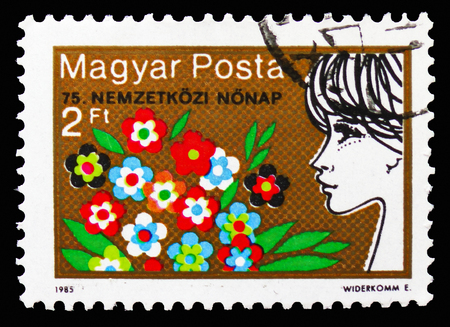 MOSCOW, RUSSIA - SEPTEMBER 15, 2018: A stamp printed in Hungary devoted to International Women's Day, serie, circa 1985のeditorial素材
