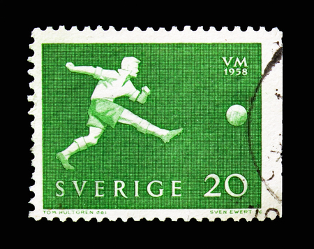 MOSCOW, RUSSIA - AUGUST 18, 2018: A stamp printed in Sweden shows World Cup Football, serie, circa 1958のeditorial素材