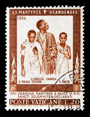 MOSCOW, RUSSIA - AUGUST 18, 2018: A stamp printed in Vatican shows St. Charles Lwanga, Sanctification of the Martyrs of Uganda serie, circa 1965のeditorial素材