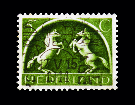 MOSCOW, RUSSIA - AUGUST 18, 2018: A stamp printed in Netherlands shows Rising Grey Horses, German...